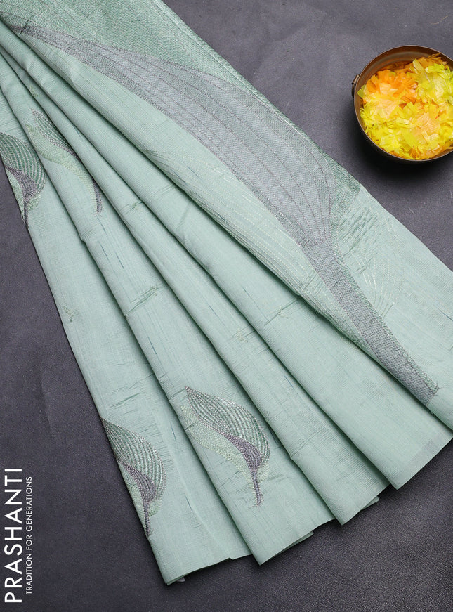 Semi raw silk saree pastel green with leaf embroidery buttas in borderless style