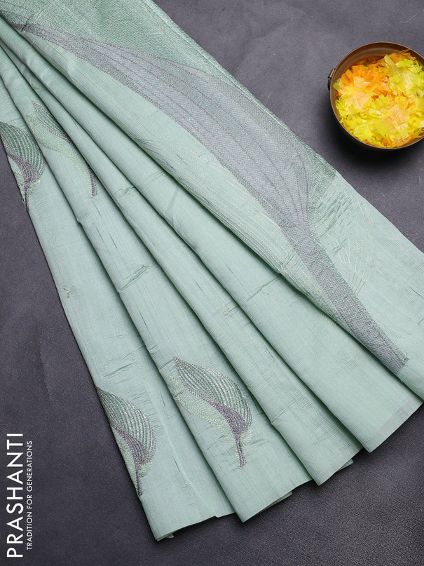 Semi raw silk saree pastel green with leaf embroidery buttas in borderless style
