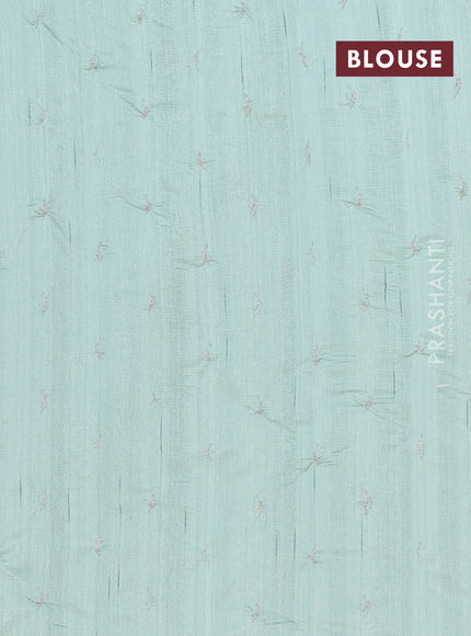 Semi raw silk saree pastel green with leaf embroidery buttas in borderless style