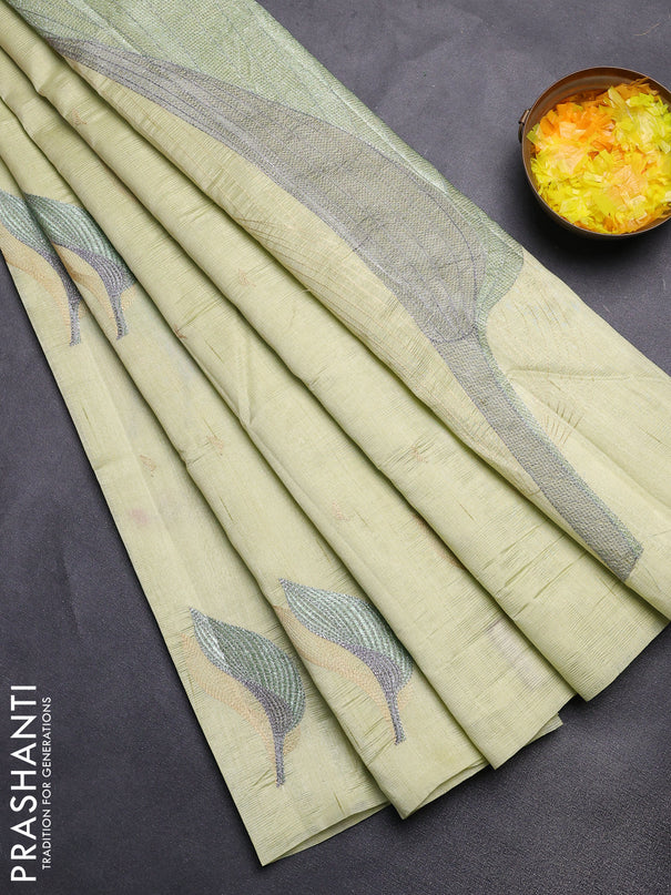 Semi raw silk saree pista green with leaf embroidery buttas in borderless style