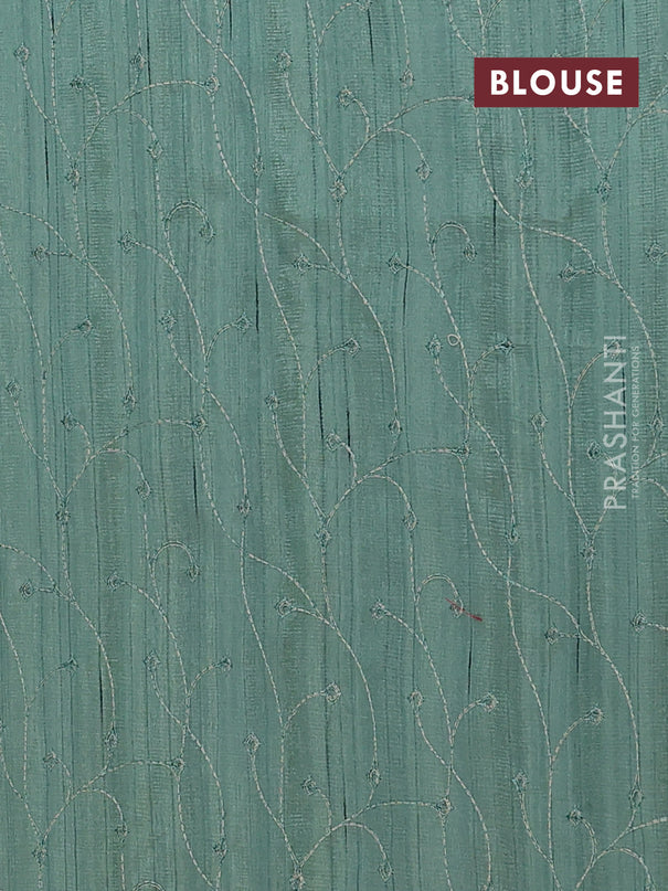 Semi raw silk saree green shade with embroidery buttas and long embroidery border