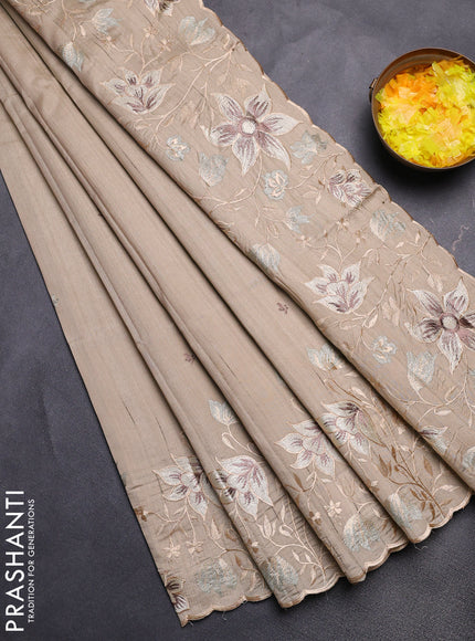 Semi raw silk saree beige with embroidery buttas and floral embroidery border