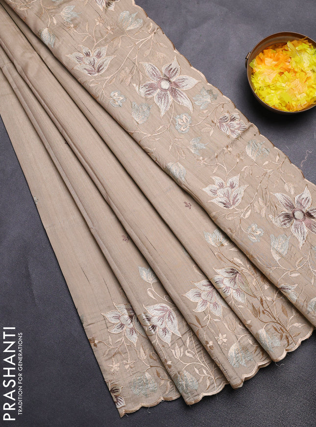 Semi raw silk saree beige with embroidery buttas and floral embroidery border