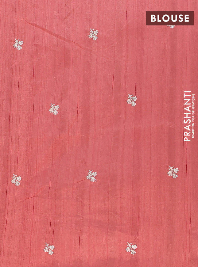 Semi raw silk saree peach orange with embroidery buttas and floral embroidery border