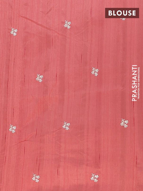 Semi raw silk saree peach orange with embroidery buttas and floral embroidery border