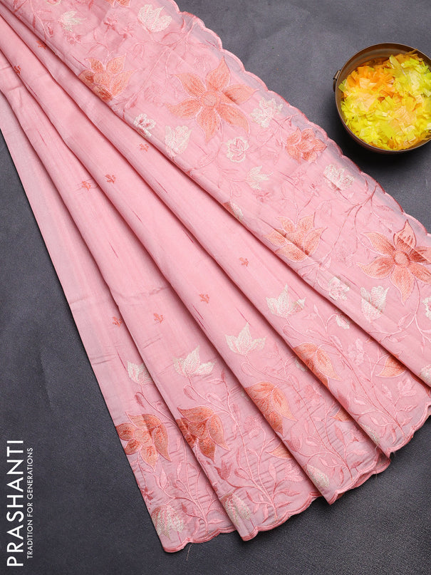 Semi raw silk saree peach orange with embroidery buttas and floral embroidery border