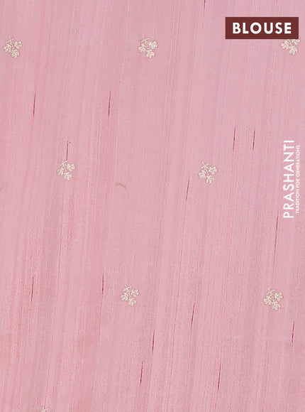 Semi raw silk saree peach orange with embroidery buttas and floral embroidery border