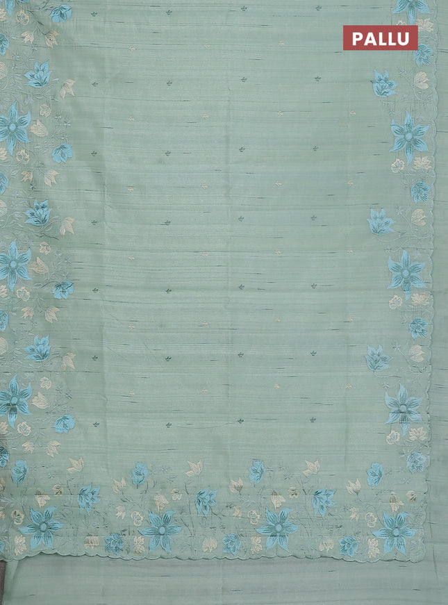 Semi raw silk saree pastel green with embroidery buttas and floral embroidery border