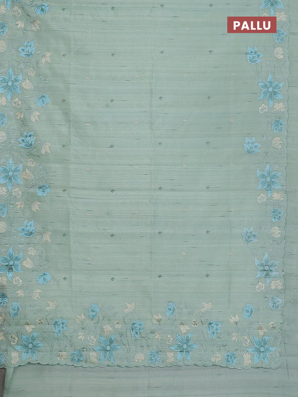 Semi raw silk saree pastel green with embroidery buttas and floral embroidery border