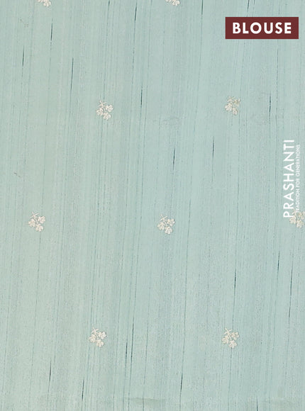 Semi raw silk saree pastel green with embroidery buttas and floral embroidery border