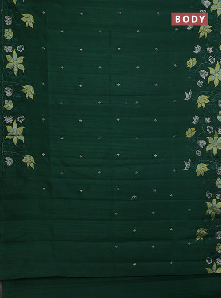 Semi raw silk saree dark green with embroidery buttas and floral embroidery border