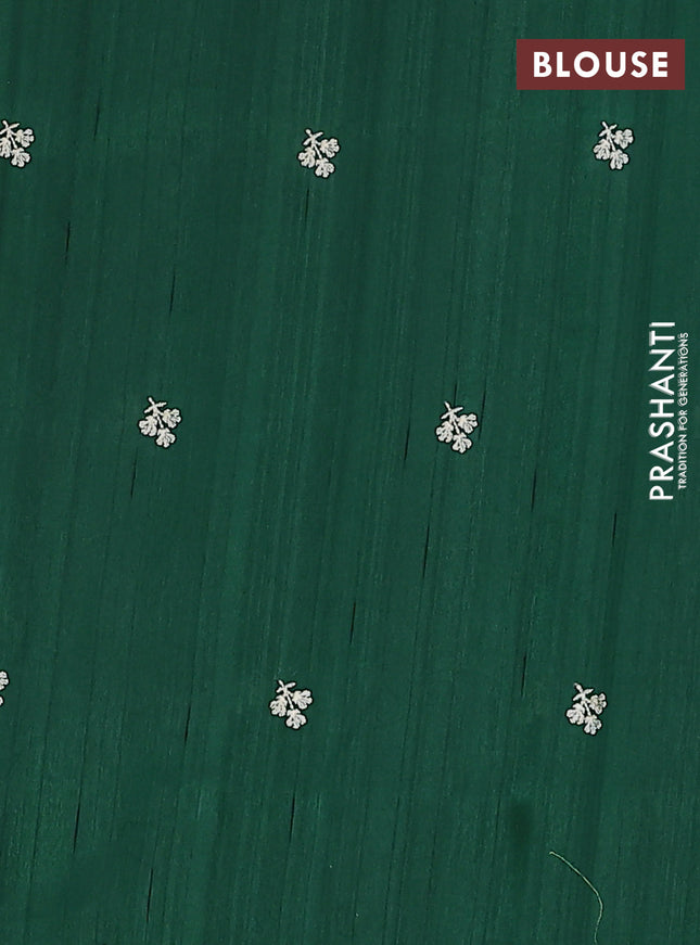 Semi raw silk saree dark green with embroidery buttas and floral embroidery border