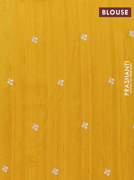 Semi raw silk saree mustard yellow with embroidery buttas and floral embroidery border