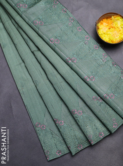 Semi raw silk saree green with embroidery buttas and long embroidery border