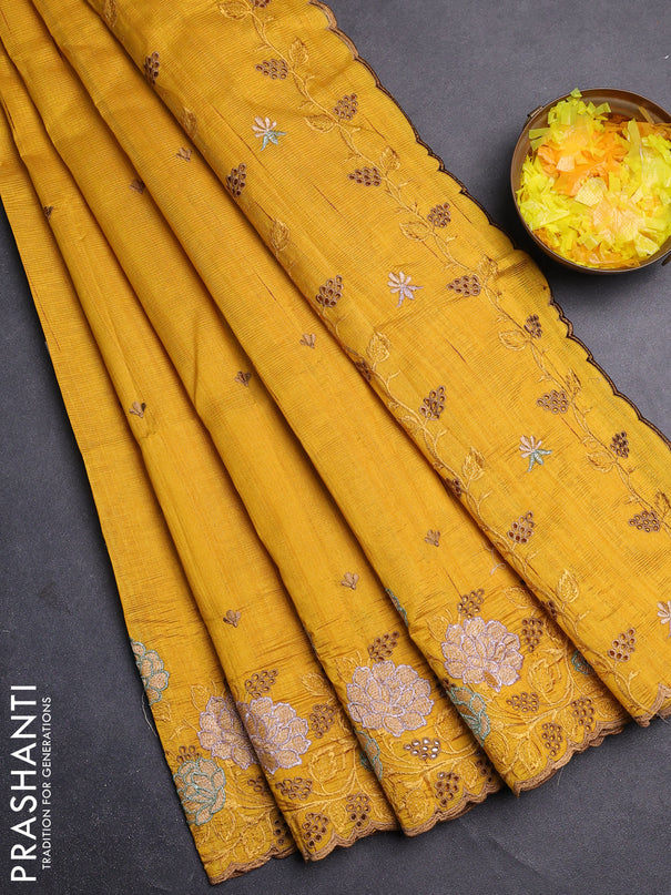 Semi raw silk saree mustard yellow with embroidery buttas and floral embroidery cut work border