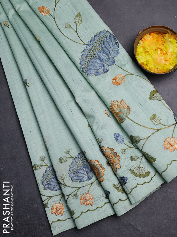 Semi raw silk saree pastel green with embroidery buttas and floral embroidery border
