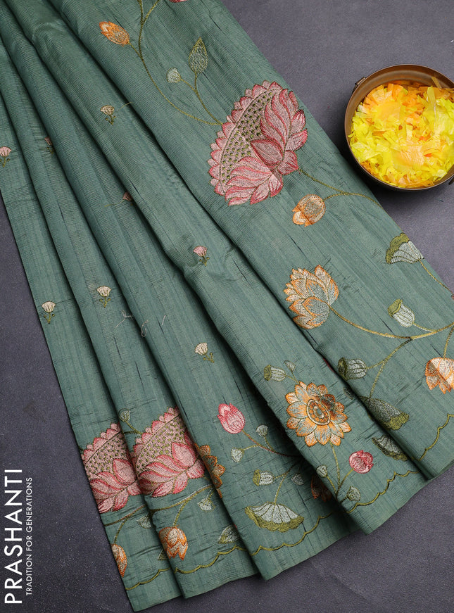 Semi raw silk saree green shade with embroidery buttas and floral embroidery border