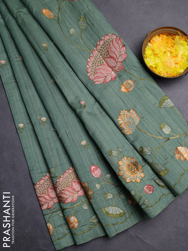 Semi raw silk saree green shade with embroidery buttas and floral embroidery border