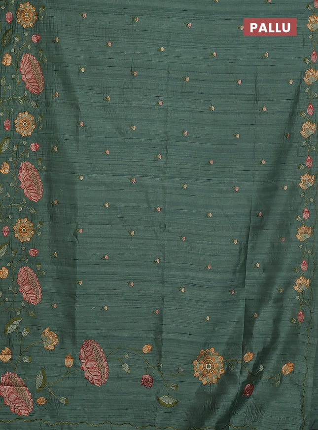 Semi raw silk saree green shade with embroidery buttas and floral embroidery border