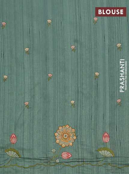 Semi raw silk saree green shade with embroidery buttas and floral embroidery border