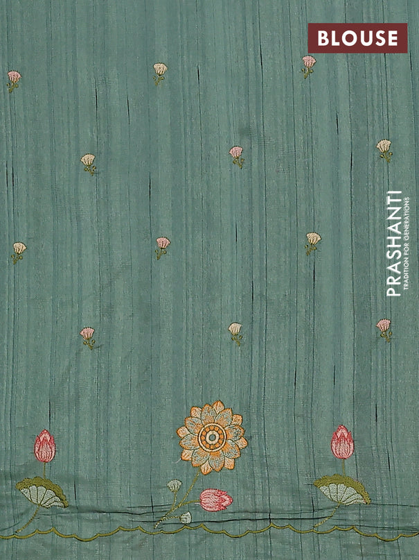 Semi raw silk saree green shade with embroidery buttas and floral embroidery border