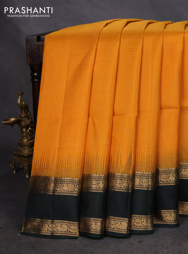 Pure soft silk saree mango yellow and dark green with allover small zari checked pattern and rettapet zari woven border