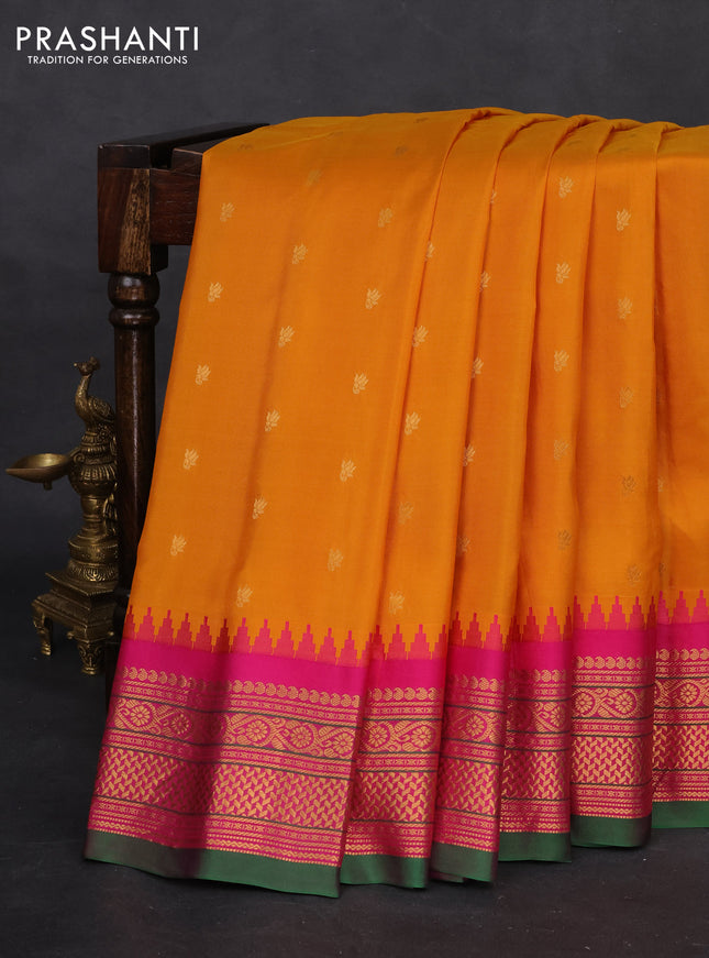 Pure gadwal silk saree mustard yellow and pink with zari woven buttas and temple design zari woven border