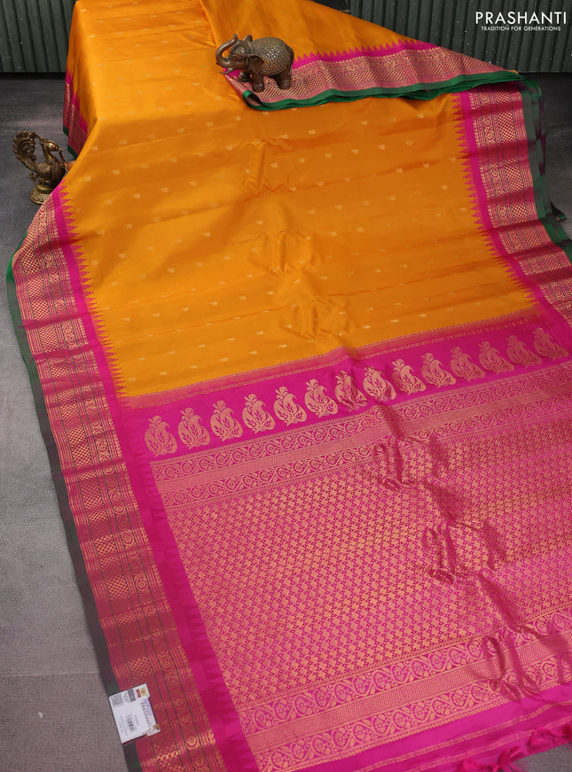 Pure gadwal silk saree mustard yellow and pink with zari woven buttas and temple design zari woven border