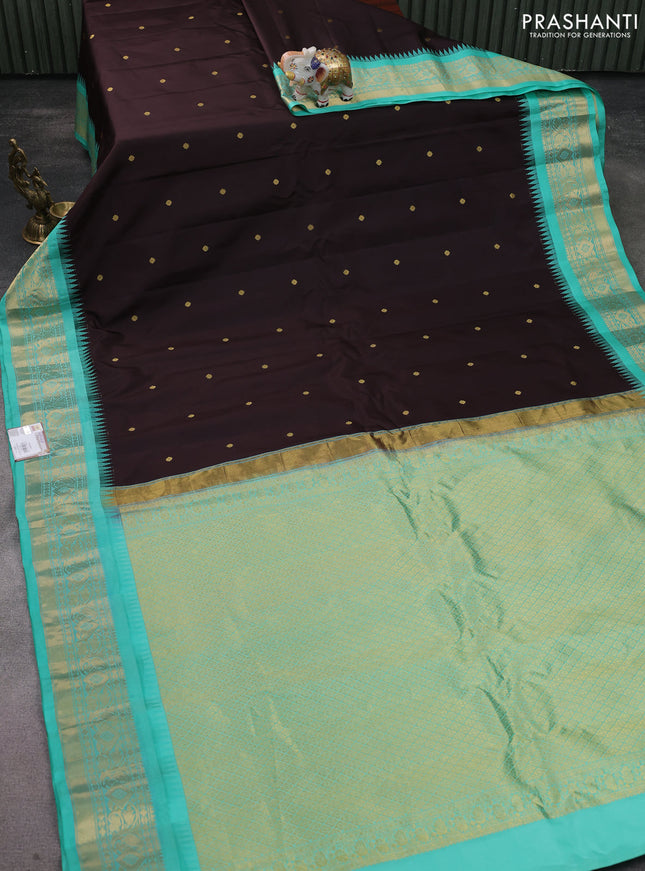 Pure gadwal silk saree coffe brown and teal green with zari woven buttas and temple design zari woven border