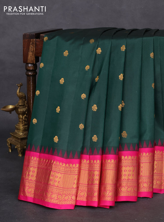 Pure gadwal silk saree bottle green and pink with zari woven buttas and temple design zari woven border