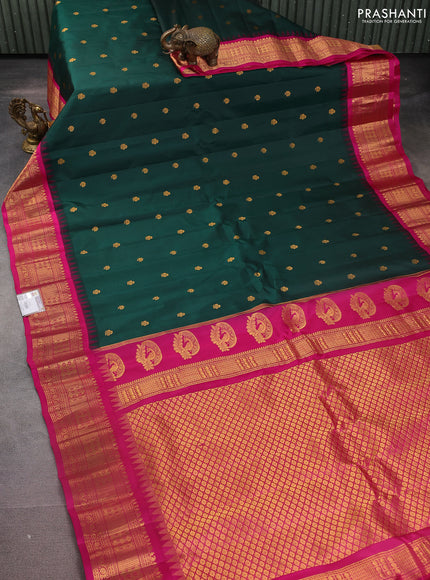 Pure gadwal silk saree bottle green and pink with zari woven buttas and temple design zari woven border