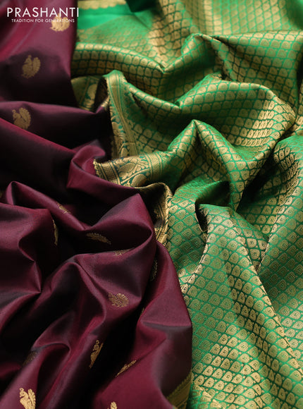 Pure gadwal silk saree deep wine shade and green with annam zari woven buttas and temple design zari woven border