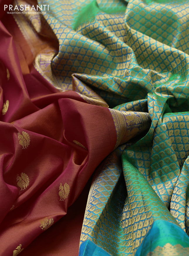 Pure gadwal silk saree red and dual shade of teal green with annam zari woven buttas and temple design zari woven border