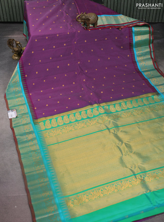 Pure gadwal silk saree purple and teal blue with allover checked pattern and temple design zari woven border