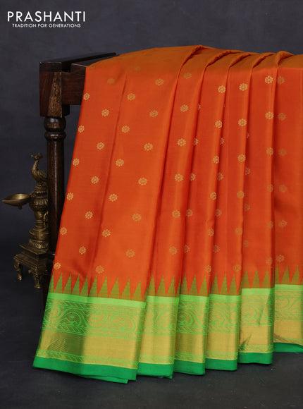 Pure gadwal silk saree orange and light green with zari woven buttas and temple design zari woven border