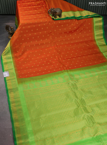 Pure gadwal silk saree orange and light green with zari woven buttas and temple design zari woven border