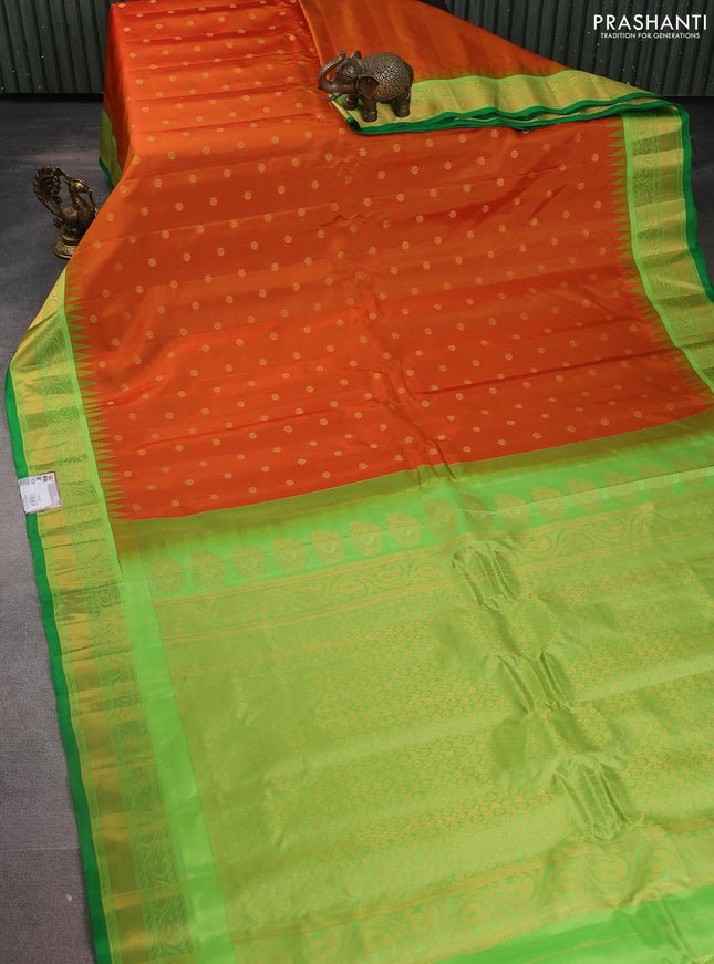 Pure gadwal silk saree orange and light green with zari woven buttas and temple design zari woven border