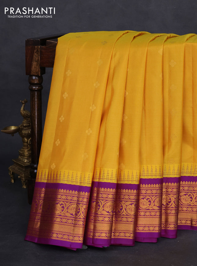 Pure gadwal silk saree yellow and purple with zari woven buttas and temple design zari woven border