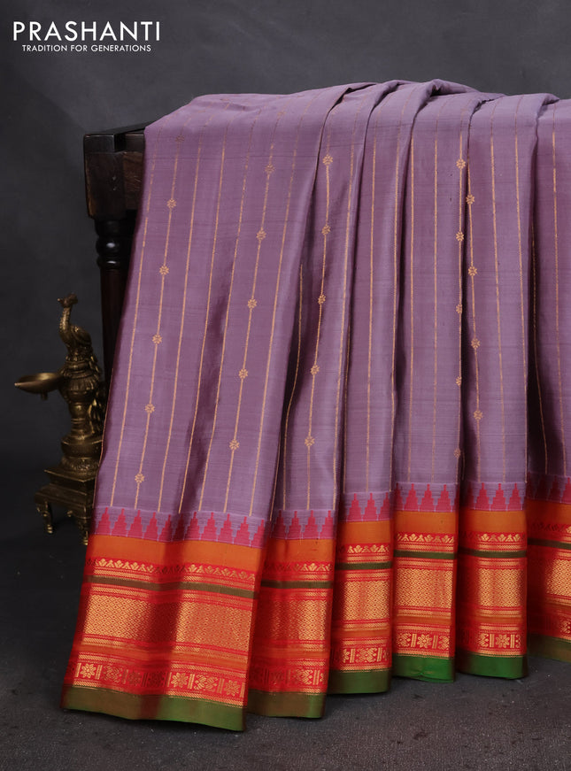 Pure gadwal silk saree pastel lavender and red with allover zari weaves and temple design zari woven border
