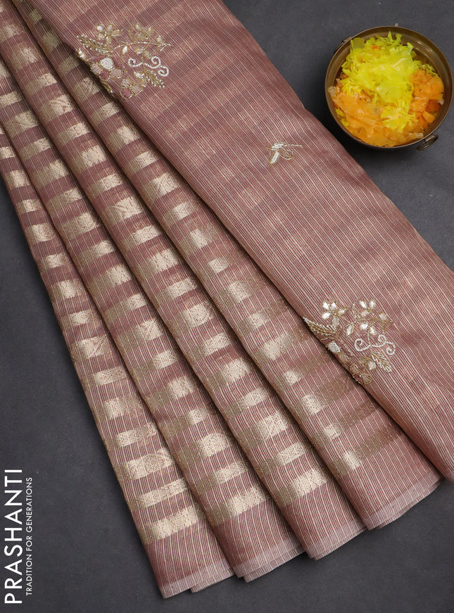 Kota tissue saree pastel maroon with allover zari weaves and embroidery butta border