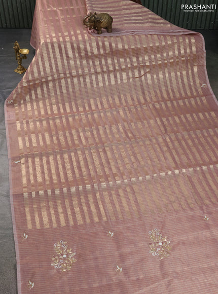Kota tissue saree pastel maroon with allover zari weaves and embroidery butta border