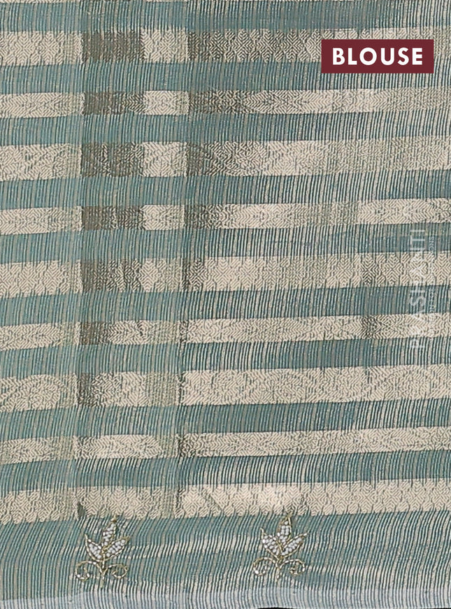 Kota tissue saree teal green with allover zari weaves and embroidery butta border