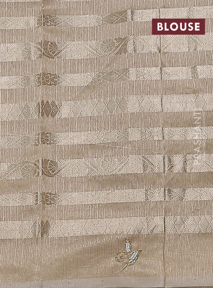 Kota tissue saree beige with allover zari weaves and embroidery butta border