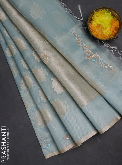 Kota tissue saree teal blue with zari woven floral buttas and embroidery butta border