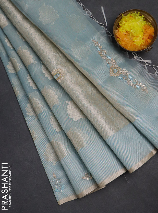 Kota tissue saree teal blue with zari woven floral buttas and embroidery butta border