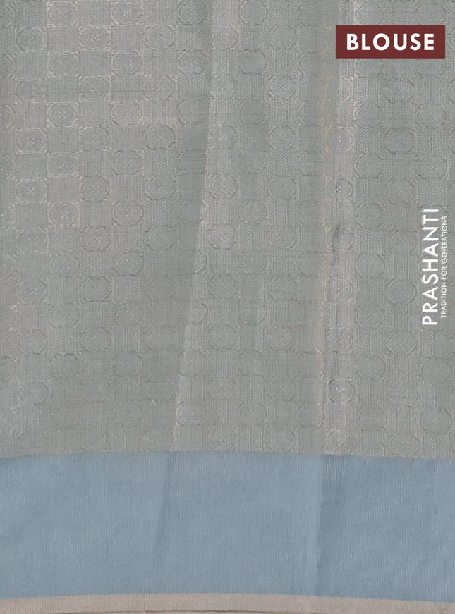 Kota tissue saree teal blue with zari woven floral buttas and embroidery butta border