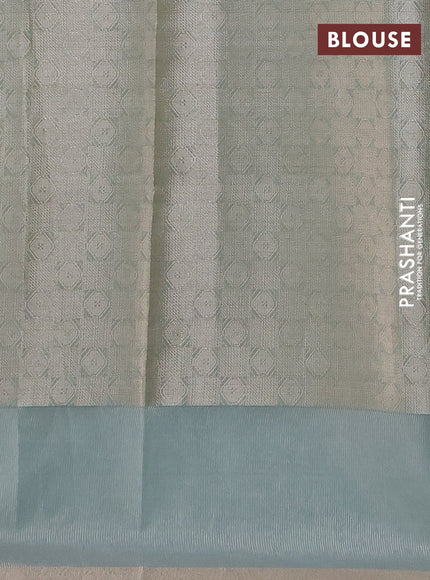 Kota tissue saree teal green with zari woven floral buttas and embroidery butta border