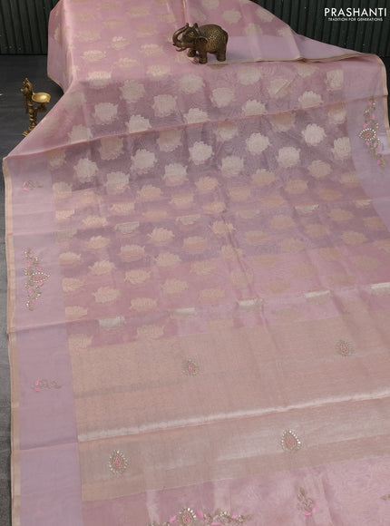 Kota tissue saree light pink with zari woven floral buttas and embroidery butta border