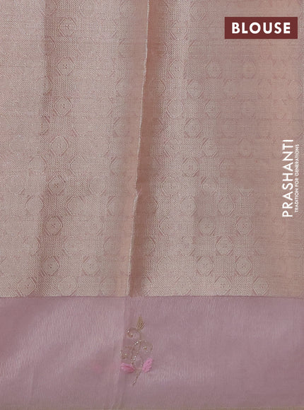 Kota tissue saree light pink with zari woven floral buttas and embroidery butta border