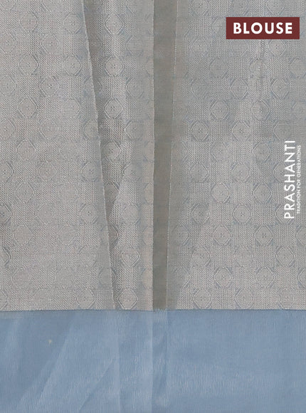 Kota tissue saree light blue with zari woven floral buttas and embroidery butta border